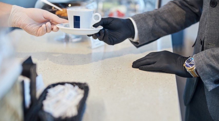 Counterfeit luxury goods displayed on table