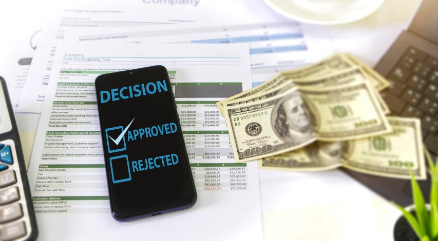 Person reviewing duplicate payment transaction records