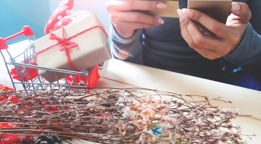 Shopper examining suspicious discounted luxury goods
