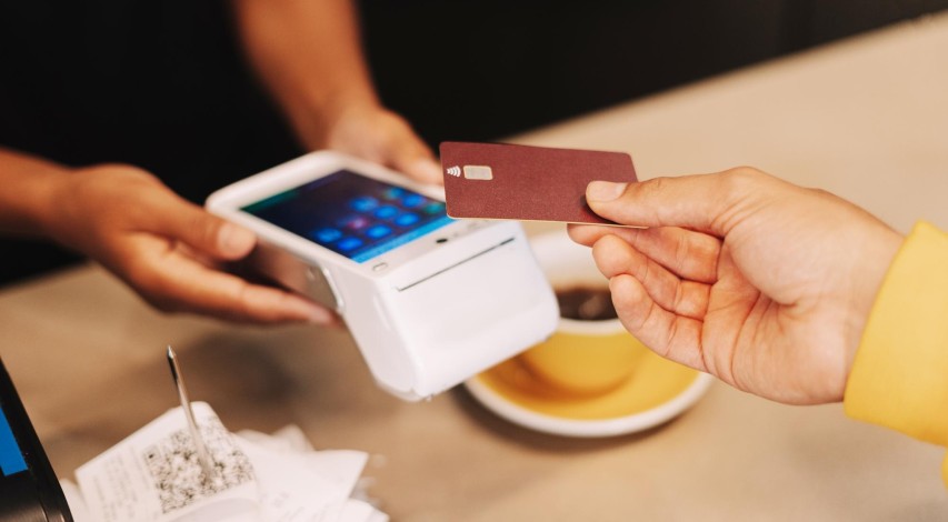 Business owner reviewing credit card processing fees