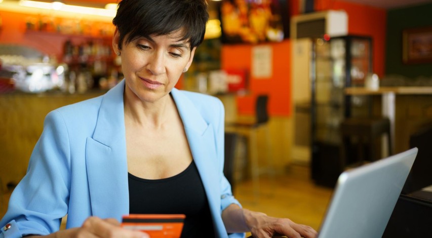 Person reviewing credit card processing fees