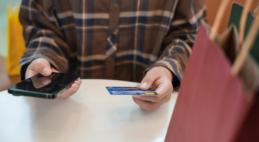 Merchant reviewing costly ACH return transactions