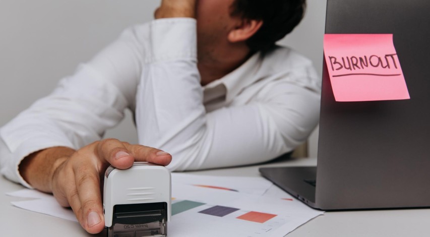 Frustrated person reviewing lengthy dispute paperwork