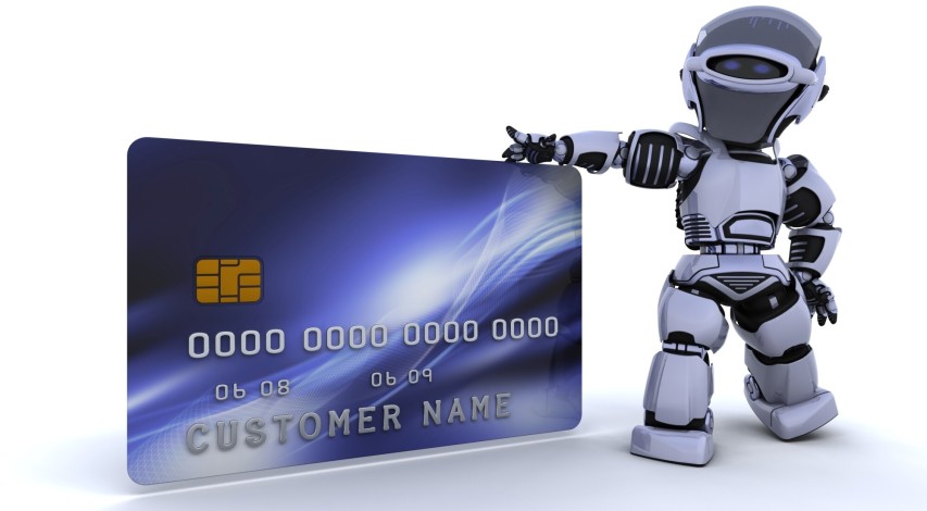 Fraudster using laptop for card fraud